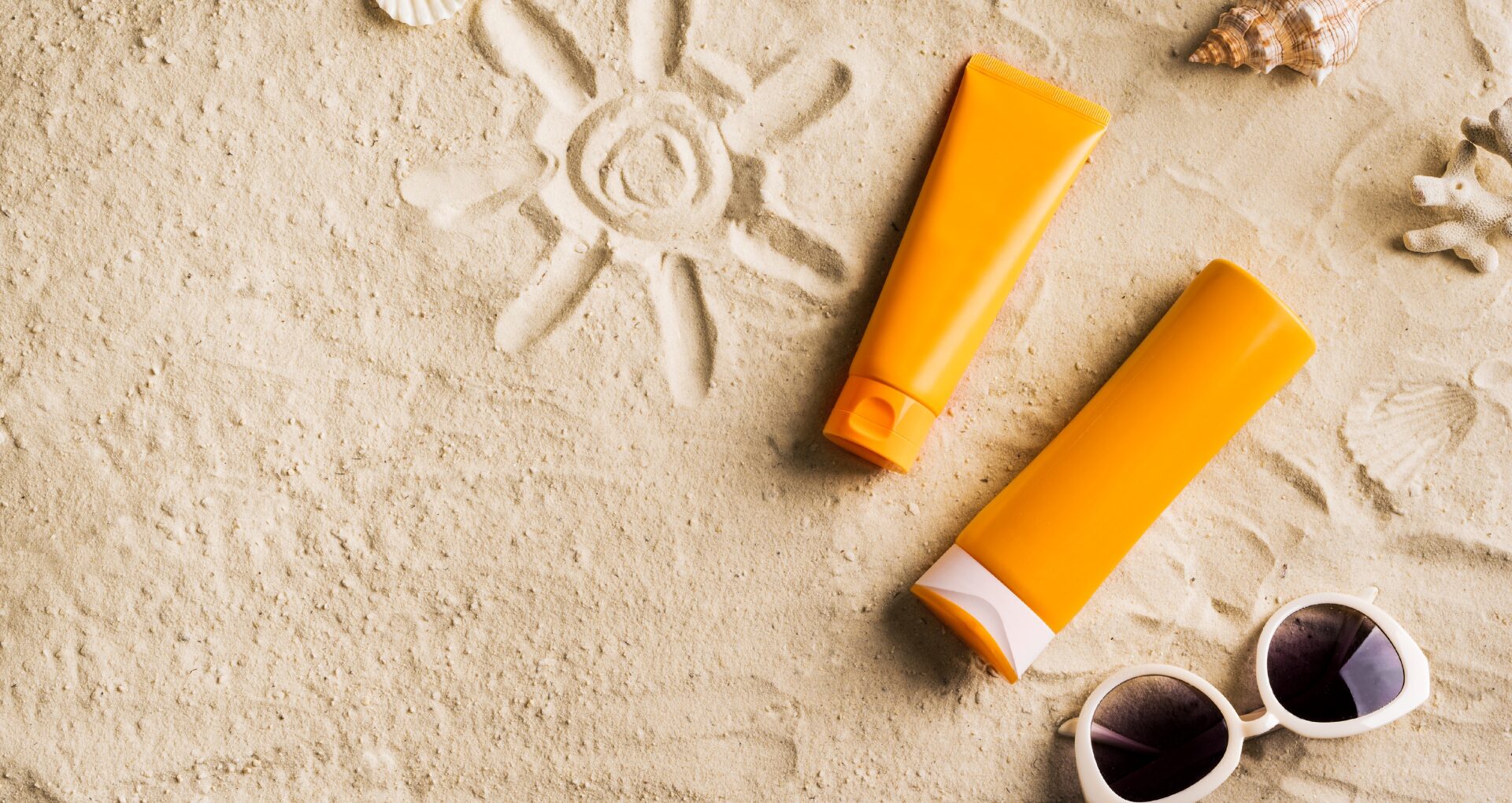 zonnebrand zonnebril aftersun zand strand vakantie